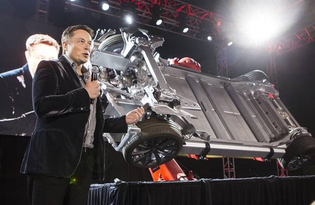Elon Musk, CEO of Tesla Motors Inc., announces its Tesla D in October, 2014.