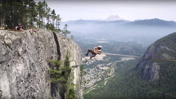 Spencer Seabrooke, the guy who walked the line 290 metres off the ground in Squamish two summers ago without a safety harness - fall off and die. Slacklining for Dave Ebner story in Life.