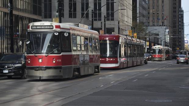 A line of TTC streetcars westbound on King St. West, are pictured approaching University Ave. on May 11 , 2017.
