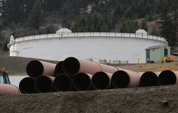Replacement pipe is stored near crude oil storage tanks at Kinder Morgan's Trans Mountain Pipeline terminal in Kamloops, B.C. on Nov. 15, 2016.