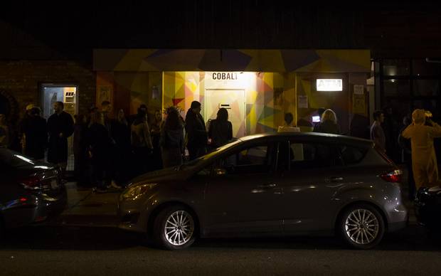 People line up outside The Cobalt Cabaret in Vancouver, B.C., on Friday October 27, 2017.