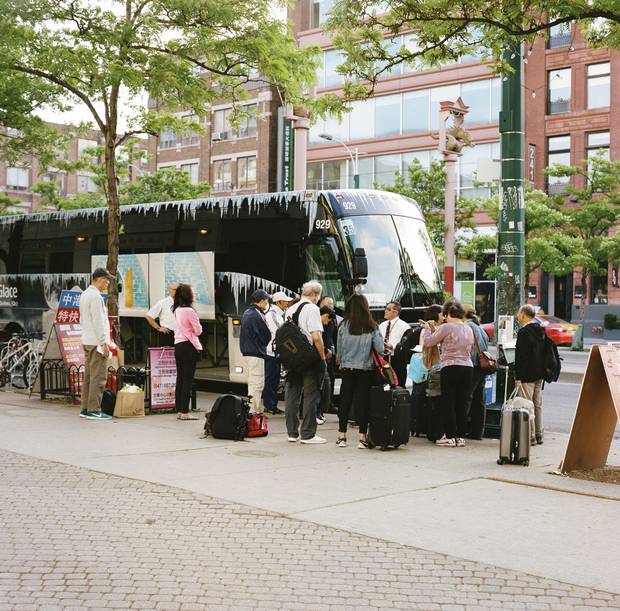Toronto: The motor coach departs from Spadina Avenue in Chinatown.