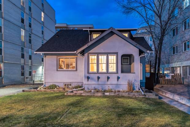 Home of Beverley Downey at 1322 13th Ave. in Calgary's Beltline district. The tiny home amid a sea of high- and mid-rise development is currently for sale.
