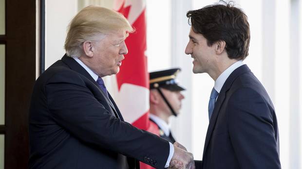 U.S. President Donald Trump welcomes Canadian Prime Minister Justin Trudeau outside the West Wing of the White House on Feb. 13, 2017.