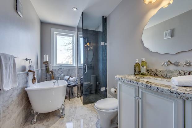 The clawfoot tub in the loft bathroom illustrates the thoughtfulness of the interior design.