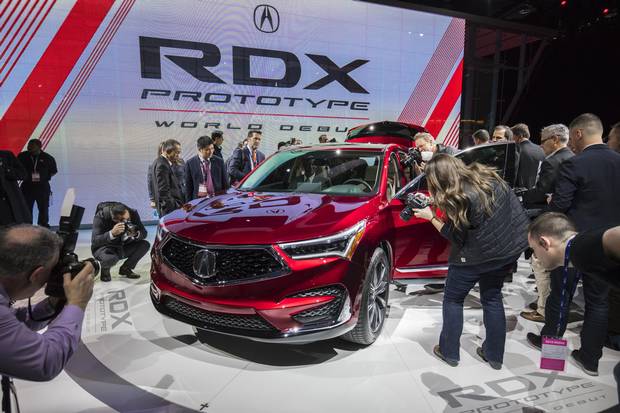 Members of the media get their first close-up look at the 2019 Acura RDX Prototype at the 2018 North American International Auto Show in Detroit on Jan. 15, 2018.