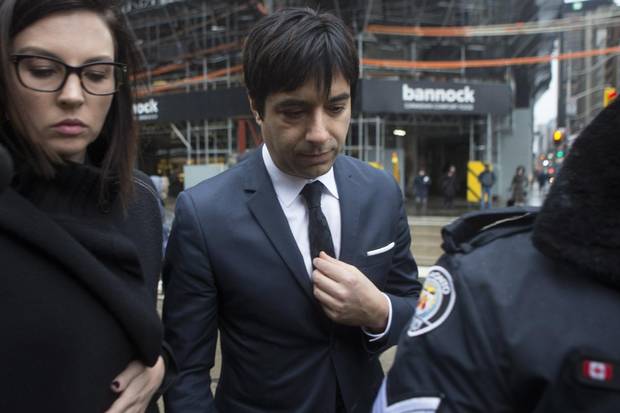 Jian Ghomeshi arrives at a Toronto courthouse on March 24, 2016, for the verdict in his trial.