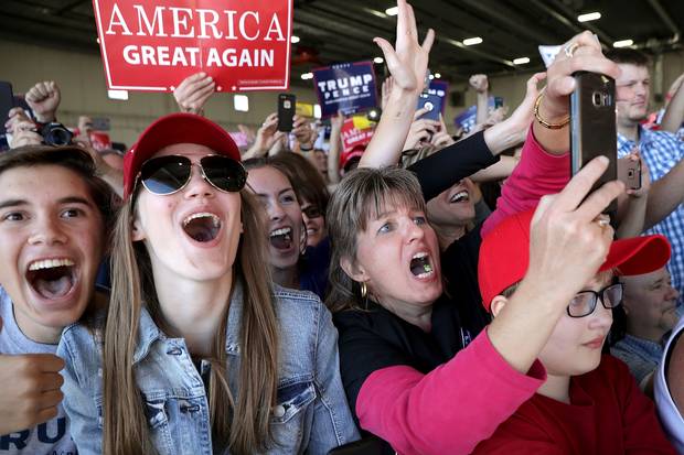Supporters cheer for Donald Trump during a campaign rally in the Sun Country Airlines Hangar at Minneapolis-Saint Paul International Airport on Nov. 6, 2016.