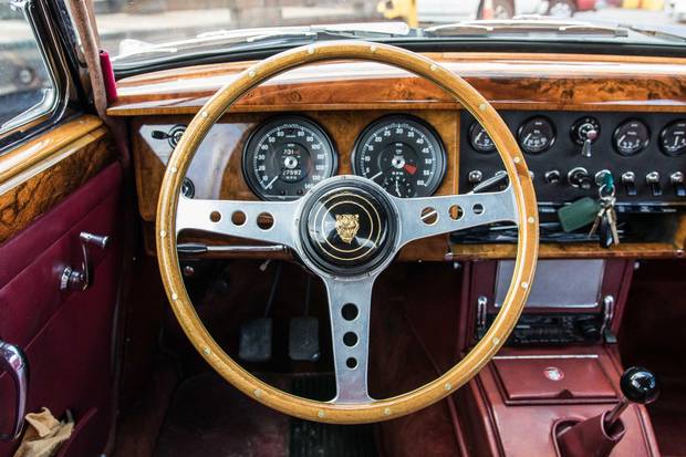 With a whiff of leather and a dash of wooden burl trim, the Mk II's interior is refined and elegant.