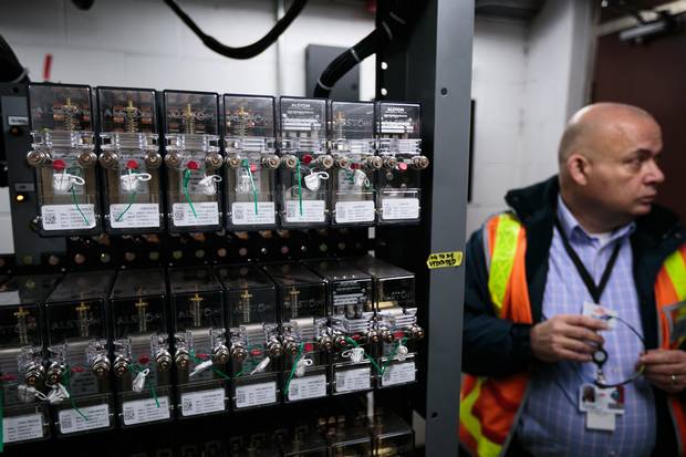 Mike Palmer, the TTC’s chief operating officer, is shown near some of the new signalling equipment.