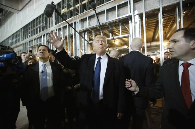 Republican presidential candidate Donald Trump enters the ballroom during a March tour of the Old Post Office Pavilion, soon to be a Trump International Hotel.