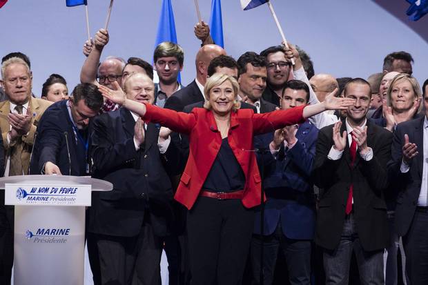 Far-right candidate for the presidential election Marine Le Pen gestures at the end of her campaign meeting in Paris, France, on April 17, 2017. 