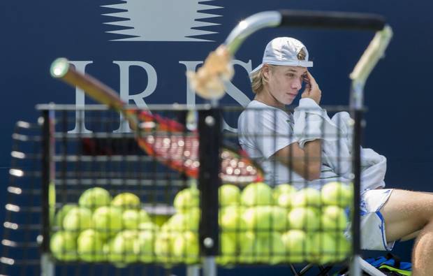 Denis Shapovalov takes a break during a training session as he prepares for the upcoming U.S. Open, Thursday, August 17, 2017 in Montreal. THE CANADIAN PRESS/Paul Chiasson