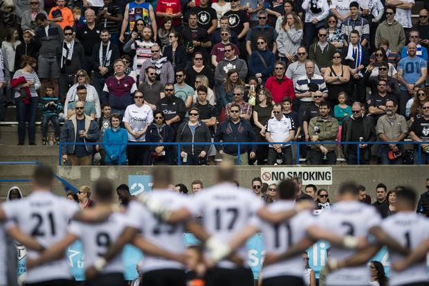 Toronto Wolfpack players stand for the national anthem before playing the Barrow Raiders in their Kingstone Press League 1 rugby match against at Lamport Stadium in Toronto, Sunday May 21, 2017.