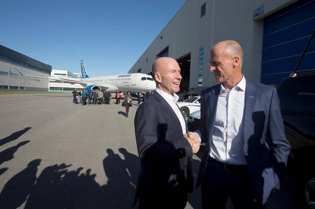 The CEOs shake on it: Bombardier’s Alain Bellemare, left, and Airbus’s Tom Enders visit the Bombardier’s plant in Mirabel, Que. in October.