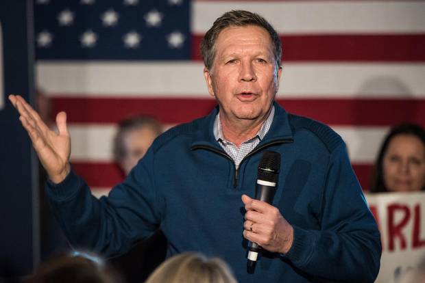 Republican presidential candidate Ohio Governor John Kasich talks to the crowd at Finn's Brick Oven Pizzaduring a campaign stop on February 10, 2016 in Mt. Pleasant, South Carolina. The South Carolina Republican primary will be held February 20, 2016.