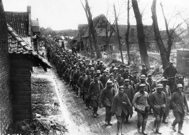 German soldiers captured at Vimy march toward a prisoner-of-war camp.