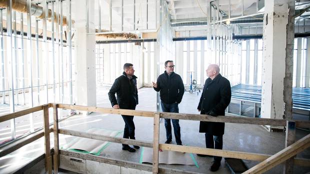 Perimeter Development partners Stewart Barclay, left, Craig Beattie, and David Gibson are active in reshaping downtown Kitchener. They’ve renovated a few historic buildings in addition to embarking on building the first Class A tower in the city in 25 years.