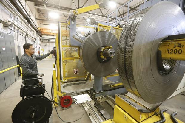 Rolls of steel from Ghana sit on the factory floor and it is expected to make about 3-400000 nickels from each roll at the Royal Canadian Mint in Winnipeg Tuesday, April 4, 2017.