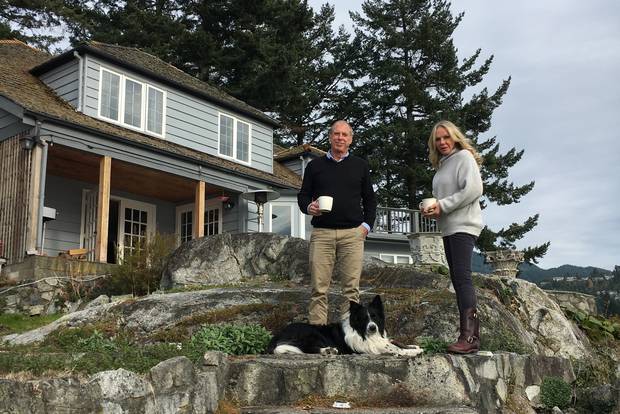 Stephanie La Porta and husband, Chris Poulter, stand on Eagle Island, West Vancouver, on the site where they want to build a coach house.