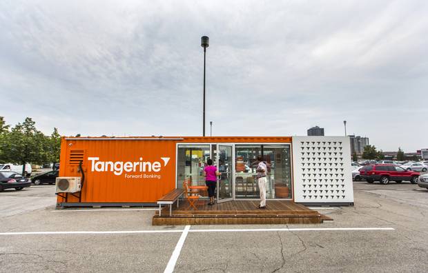 People walk into a Tangerine temporary bank branch in the Centerpoint Mall parking lot in Toronto on Aug. 18, 2015.