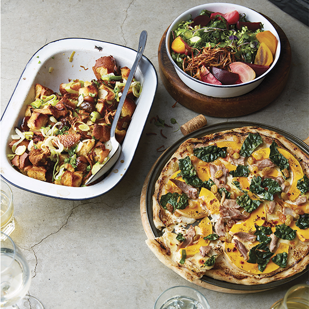 Clockwise, from top left: Brown butter brioche stuffing with chestnuts, leeks and chanterelles; roasted beets, shredded chard and brassica salad; squash and duck pizza.
