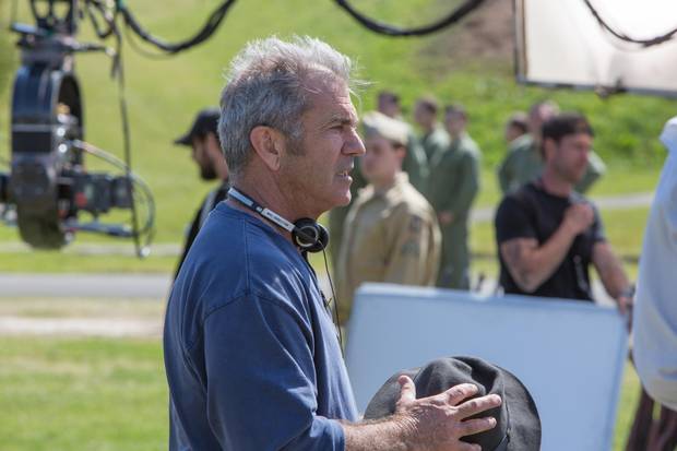 Director Mel Gibson on the set of Hacksaw Ridge.