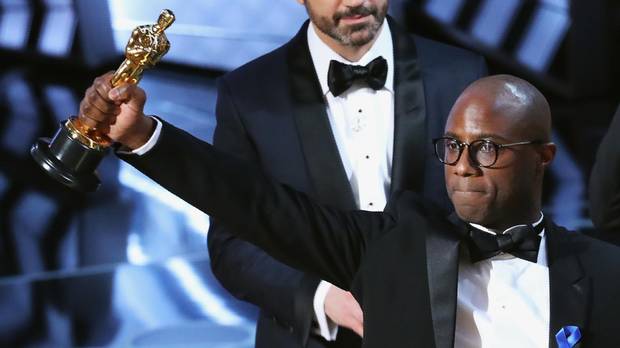 Director Barry Jenkins holds the Oscar after his film Moonlight wins the best-picture award on. Feb 26, 2017.