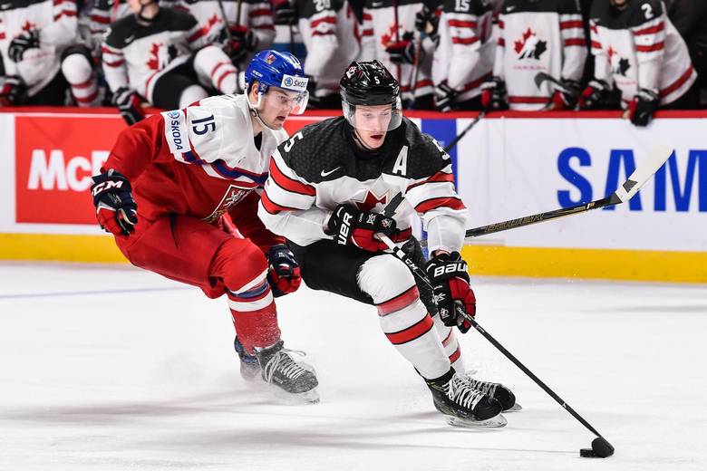 Thomas Chabot #5 of Team Canada skates the puck against Tomas Soustal #15 of Team Czech Republic during the 2017 IIHF World Junior Championship quarterfinal game at the Bell Centre on January 2, 2017 in Montreal, Quebec, Canada.