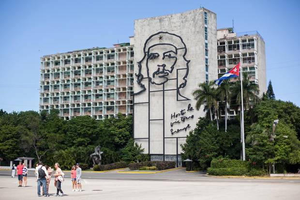 Tourists visit a museum in the Plaza de la Revolucion in Havana. The plaza often hosts political events and other public events.