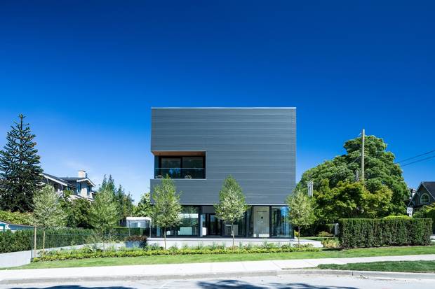 The black, galvanized steel-clad house at 3691 Point Grey Rd.