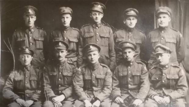 William R. (Bill) Stephens, second row, second from right, is shown in England in March, 1919, as he and his comrades wait to ship back to Canada.