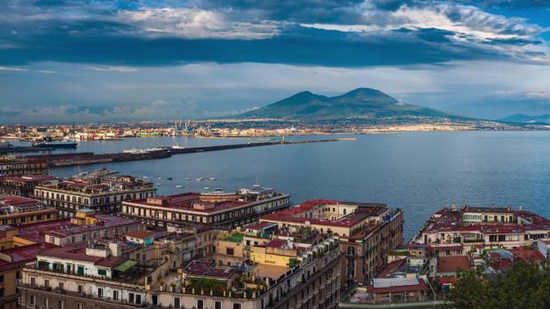 Panorama of Naples, with a view of the port in the Gulf of Naples and Mount Vesuvius.