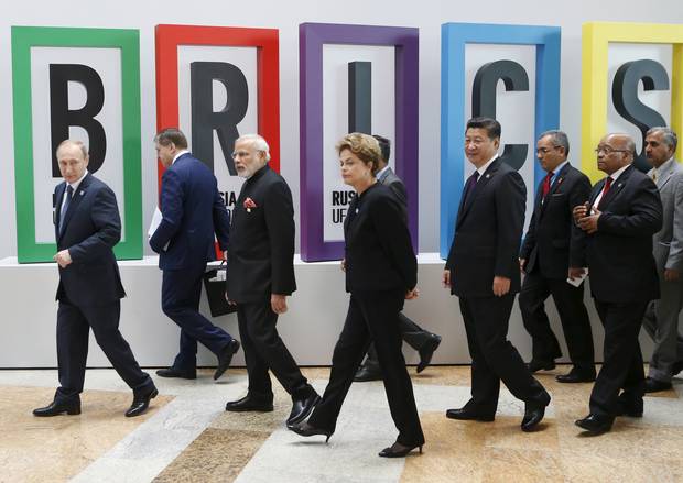 Russian President Vladimir Putin (left), Indian Prime Minister Narendra Modi (third from left), Brazil's President Dilma Rousseff (centre), Chinese President Xi Jinping (fourth from right) and South African President Jacob Zuma (second from right) at the BRICS Summit in Ufa, Russia, on July 9, 2015.