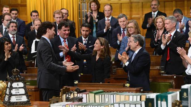 Minister of Foreign Affairs Chrystia Freeland is congratulated by Prime Minister Justin Trudeau and party members after delivering a speech in the House of Commons on Canada's Foreign Policy in Ottawa.