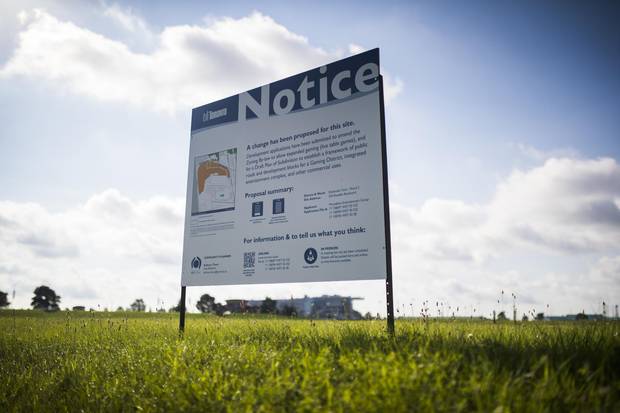 A municipal notice is seen at the Woodbine Racetrack.