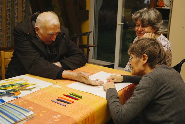 Jean Vanier visits the residents in one of the L'Arche homes in Trosly, France.