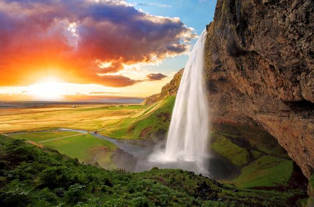 Seljalandsfoss, Iceland’s Eyjafjallajokull volcano provides photographers with a chance to shoot behind it’s waterfall.