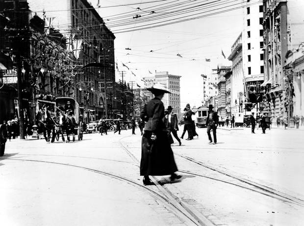 1912: Main Street, looking north from Portage Avenue. Electric streetcar lines, built two decades earlier, crisscross the intersection. (The city’s streetcar system was shut down in 1955.)