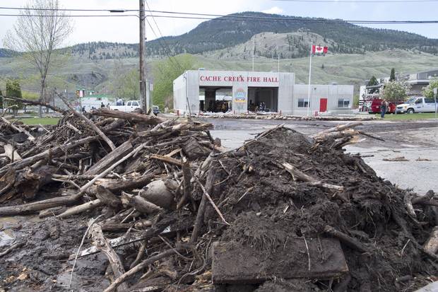 Flood debris is seen on the road in Cache Creek, B.C., on May 6, 2017.