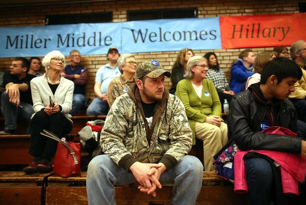 Hillary Clinton supporters look on during an event at BR Miller Middle School in Marshalltown, Iowa, on Jan. 26, 2016.