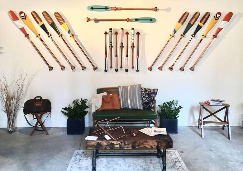 The Northern Grade shop on Beekman Street showcases wares made in the U.S., such as hand-carved and -painted paddles on the wall. 