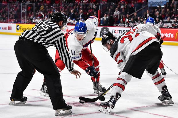 Lukas Jasek of Team Czech Republic and Anthony Cirelli of Team Canada face-off during the 2017 IIHF World Junior Championship quarterfinal game at the Bell Centre on January 2, 2017 in Montreal, Quebec, Canada.