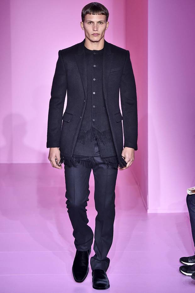 Givenchy: Designer Riccardo Tisci used fringe and a thick navy wool to take the three-piece suit in a new direction.
