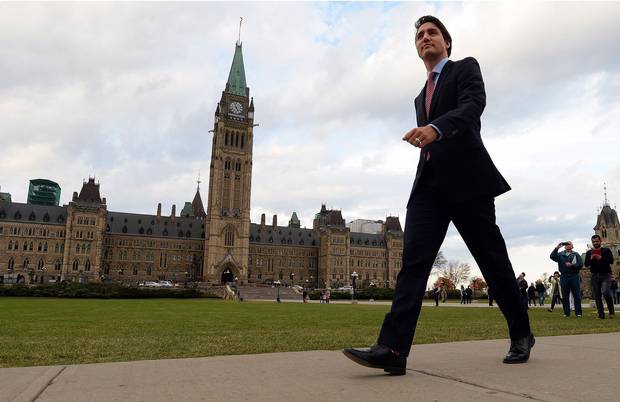 Mr. Trudeau makes his way from Parliament Hill to the National Press Theatre in Ottawa the day after the 2015 election.