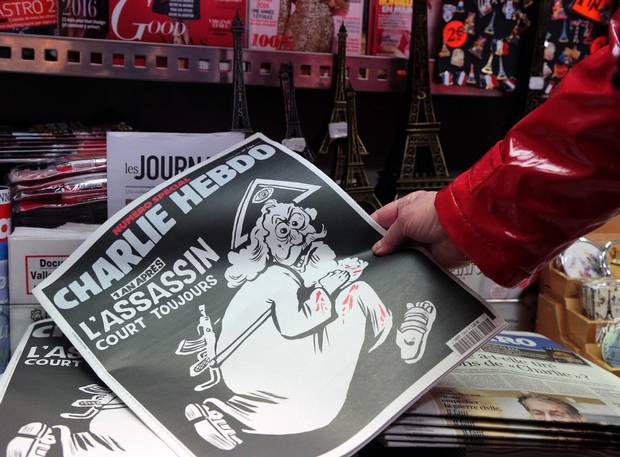 The special commemorative edition of Charlie Hebdo is shown at a Paris newsstand in Paris.