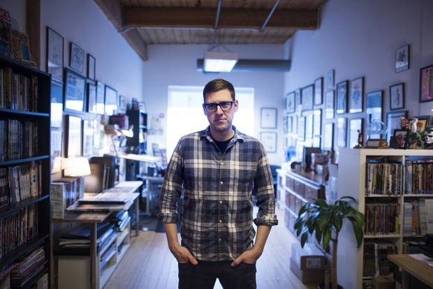 Jeff Lemire, seen in his Toronto studio, says he loves ‘bouncing between things,’ as evidenced by all the projects he’s working on at the moment.