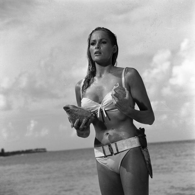 When Ursula Andress emerged from the sea with a dagger strapped to her bikini in 1962's Dr. No, she made the Bond girl an instant icon. 