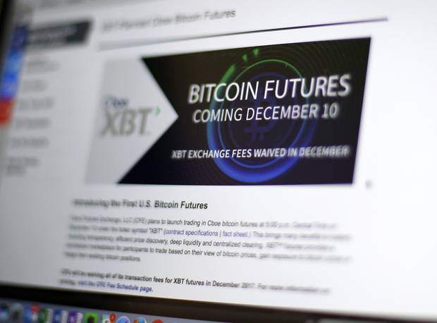 the first bitcoin futures started trading on Sunday, Dec. 10, on an exchange run by Cboe Global Markets Inc.