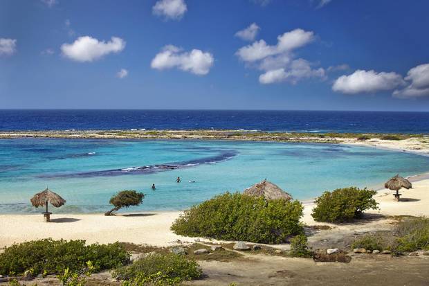 Baby Beach, located on Aruba’s southeastern tip, is a stunning and little-known destination, with a crescent of white sand and double coral reef.